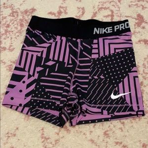Purple and Black Nike Pros